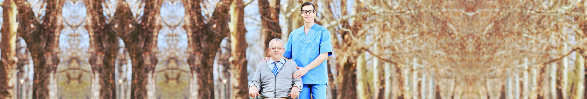 portrait of senior man in a wheelchair with caregiver