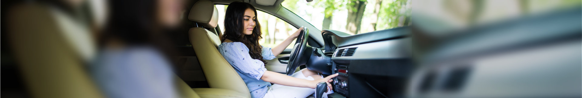 women driving a car